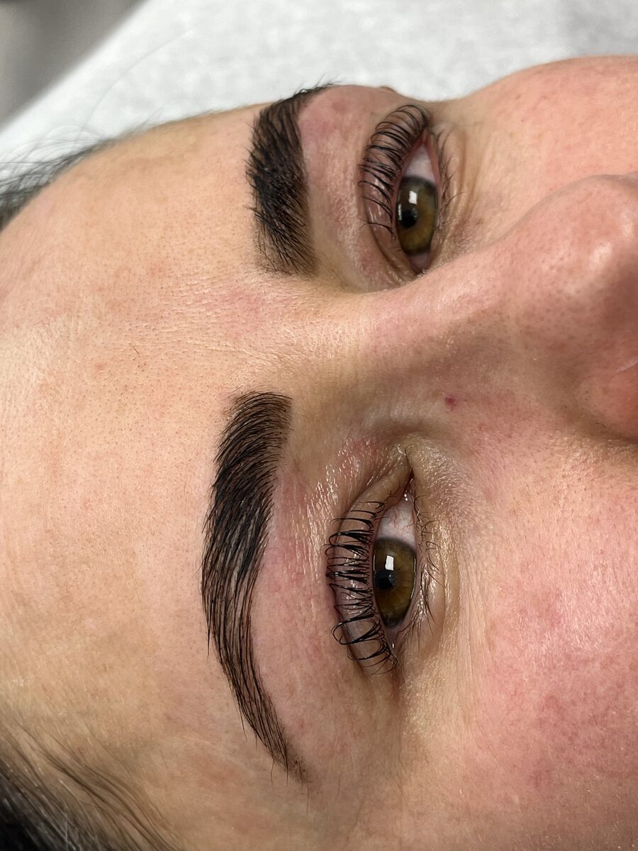 Brushed-up laminated brow close-up on a client at Urban Brows